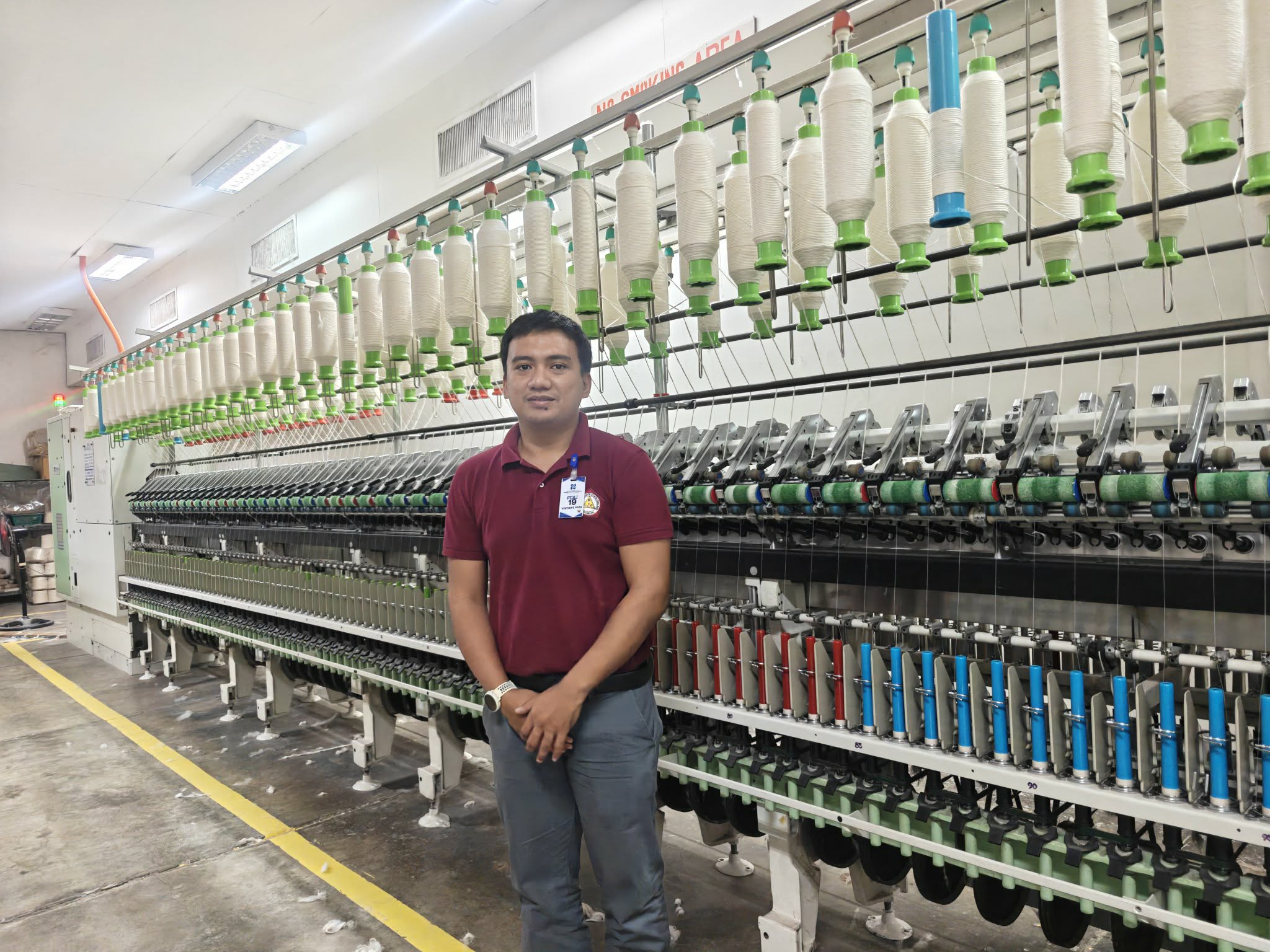 Franz standing inside an industrial production facility